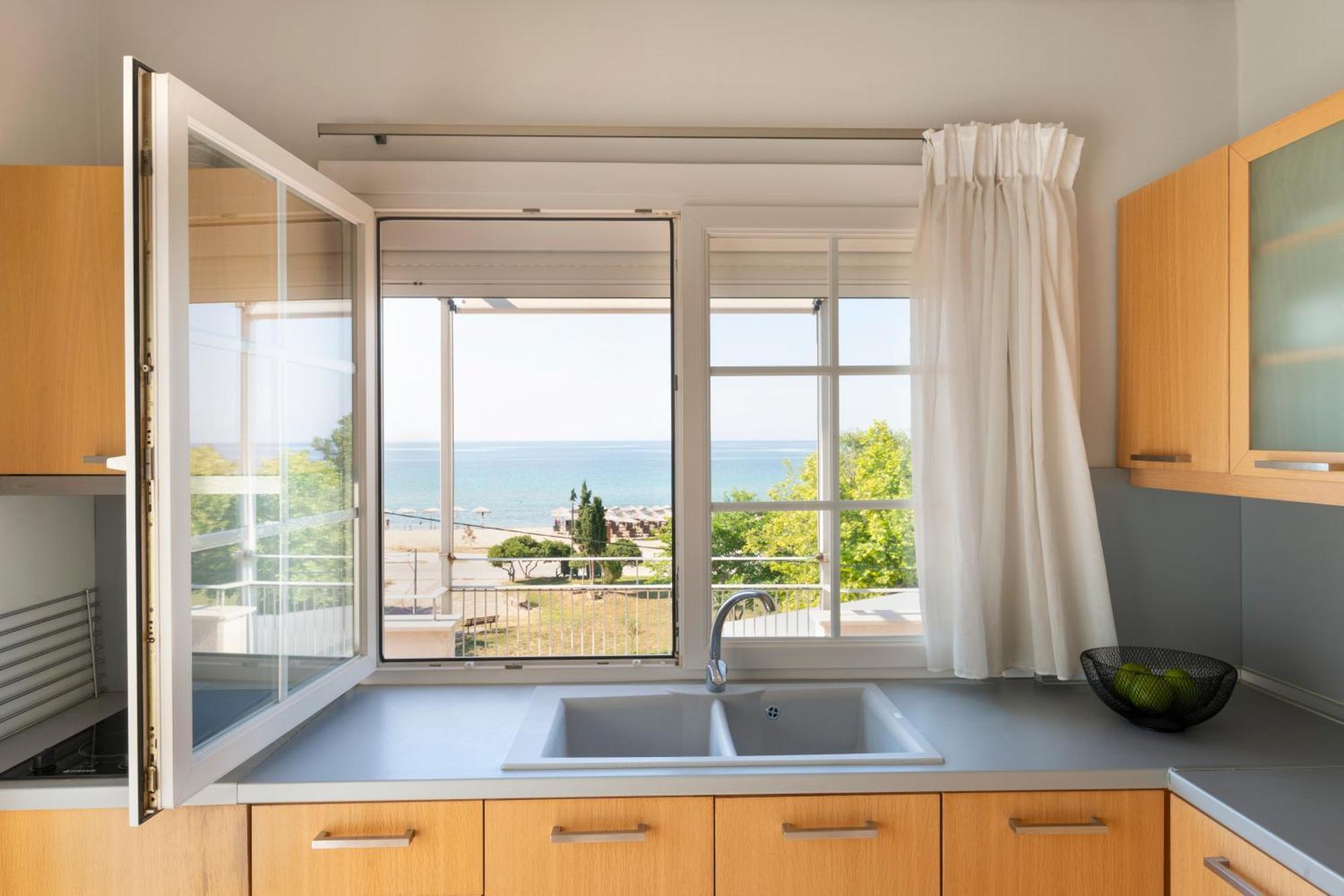 Ammos Seafront Family Apartments Неа Плагия Екстериор снимка